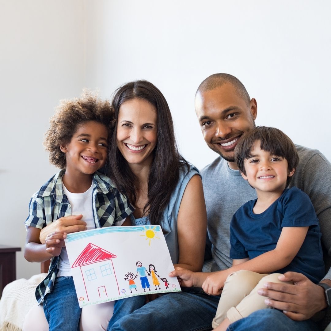 family with kids and a drawing of a family