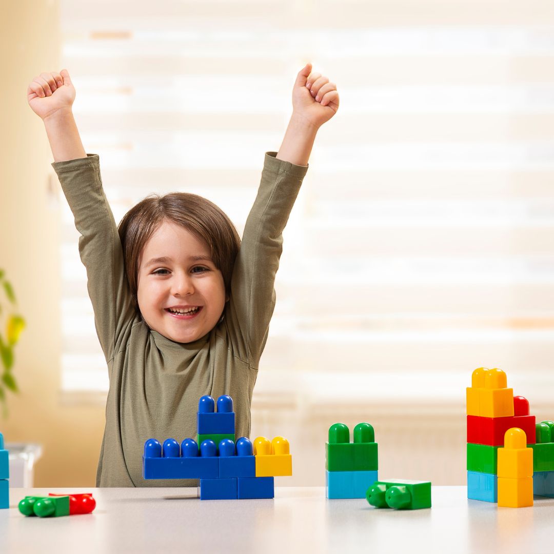 kid raising both arms