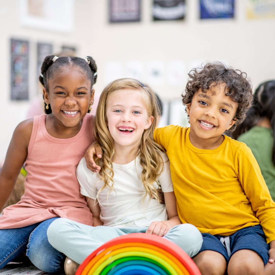 3 kids smiling