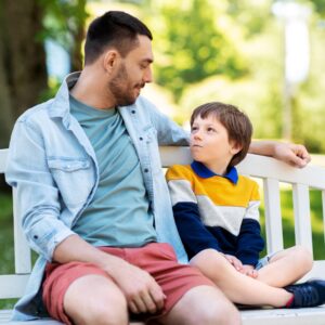 foster parent sitting with foster child 