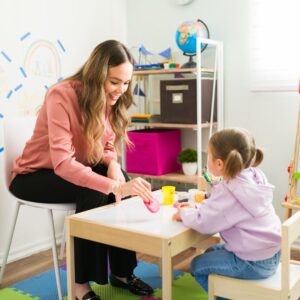 foster mother playing with foster child 